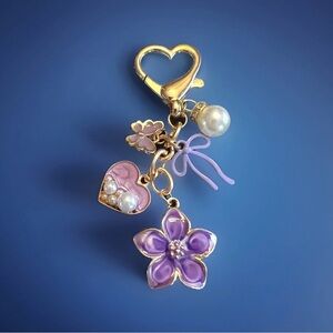 Purple floral bag charm